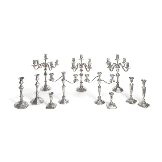 An assembled group of American and Italian weighted sterling silver candlesticks and candelabras
