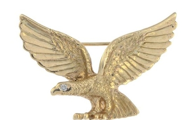 An eagle brooch, with colourless gem accent eye....