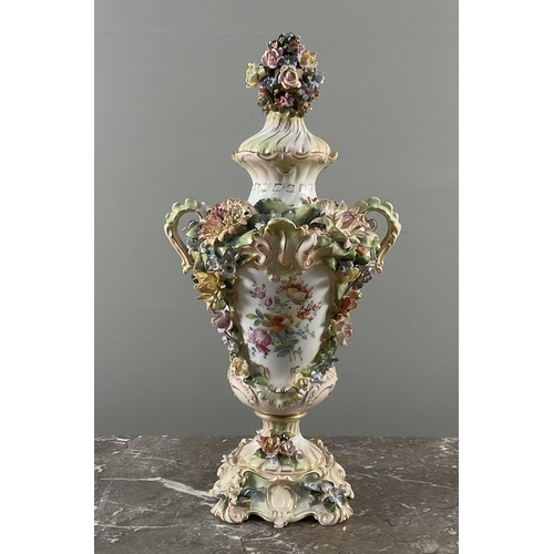 An early 20th century Rudolstadt porcelain flower encrusted ...