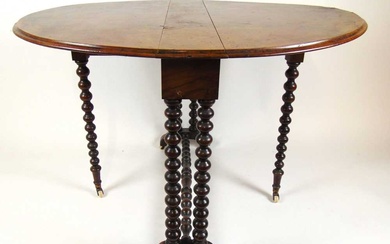 An early 20th century burr walnut Sutherland table, the oval...