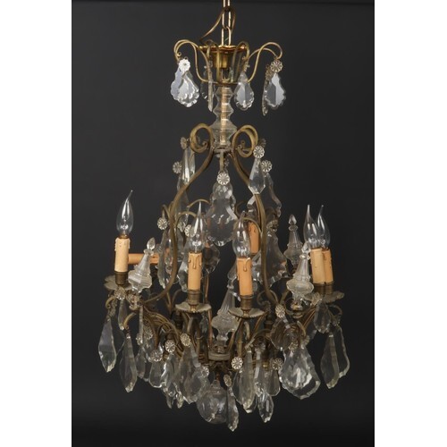 An early-mid 20th century French gilt metal and cut crystal ...