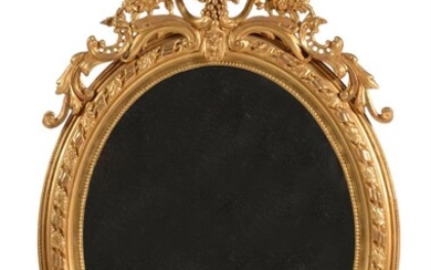 An oval giltwood wall mirror