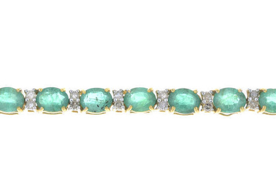 An oval-shape emerald and single-cut diamond bracelet.