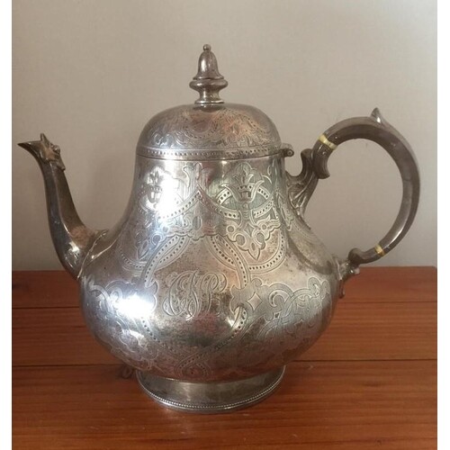 Antique Victorian silver teapot, having scroll handle and hi...