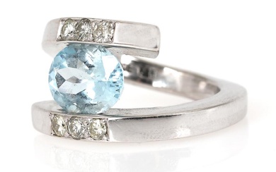 Aquamarin and diamond ring set with an oval-cut aquamarine flanked by six...