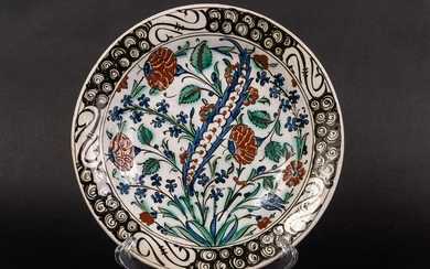 Arte Islamica An Iznik pottery dish painted with