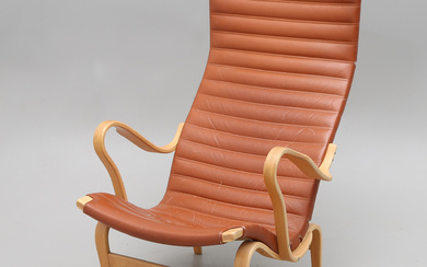 BRUNO MATHSSON. A leather “EVA HÖG” armchair, Firma Karl Mathsson 1972.