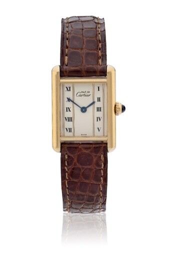 Cartier. A gold plated quartz rectangular wristwatch with column dial and together with box and papers Must de Cartier, Paris, c.1990 Cream 'column dial' with vertical Roman numerals, secret signature at 10, quartz movement, polished gold plated...