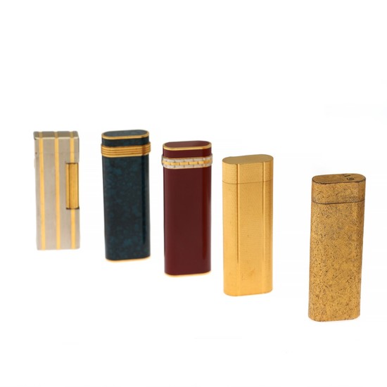 Cartier, Dupont: A collection of four Cartier lighters and a Dupont lighter. (8)