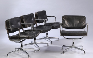 Charles Eames. A set of four armchairs, 'Intermediate Swivel Arm Chair' in black leather, model ES 102 (4)