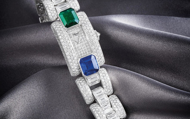 Chopard. An Exceptional and Unique White Gold Diamond, Emerald and Sapphire Set Bracelet Watch