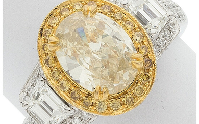 Colored Diamond, Diamond, Gold Ring Stones: Oval-shaped yellow diamond...