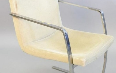 Contemporary armchair, continuous metal arms