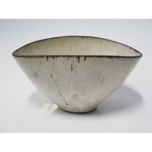 Dame Luci Rie, a shaped studio pottery stoneware bowl, impre...