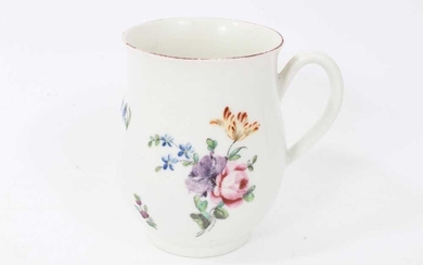 Derby baluster shaped mug, circa 1760, polychrome painted with floral sprays, red painted rim, 10cm high