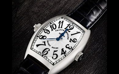 FRANCK MULLER. A LARGE 18K WHITE GOLD TONNEAU-SHAPED AUTOMATIC WRISTWATCH WITH SWEEP CENTRE SECONDS AND UNUSUAL TIME DISPLAY SECRET HOURS MODEL, REF. 8880 SE H