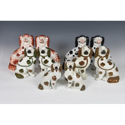 Five pairs of Staffordshire dogs, each pair with traditional...
