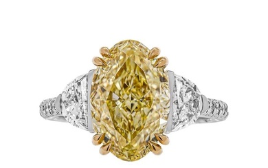 GIA Certified 4.01ct Oval Fancy Light Yellow Three-Stone Ring