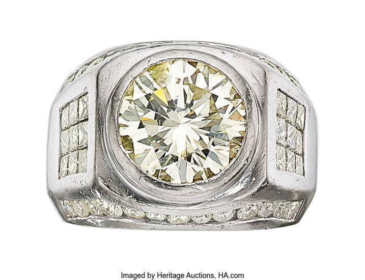 Gentleman's Diamond, Platinum Ring The ring features a round...