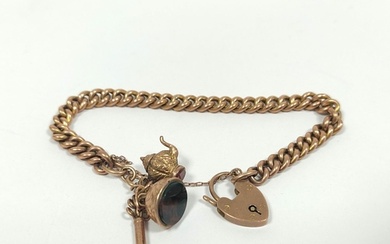 Gold curb bracelet, '9c' with three items dependent 15.7g in...