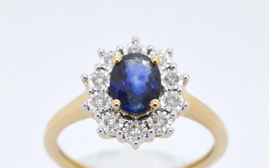 Gold entourage ring with sapphire and diamonds