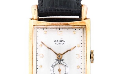 Gruen: A 10 Carat Gold Filled Curved Wristwatch, signed Gruen,...