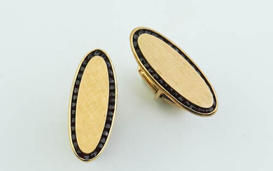 LUCIEN PICCARD 14K YELLOW GOLD AND GARNET OVAL CUFFLINKS. Stamped...