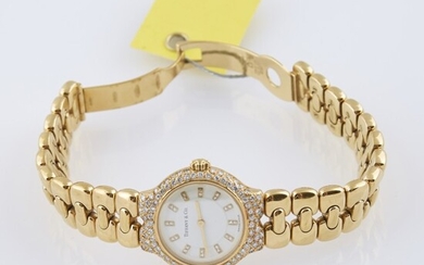 Ladys Diamond Bracelet Watch, 98 diamonds about 1.00 ct., Tiffany & Co., Quartz, 18K 47 dwt. all