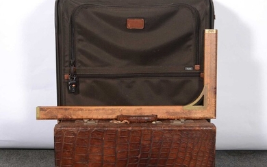 Leather suitcase, modern suitcase and two squares