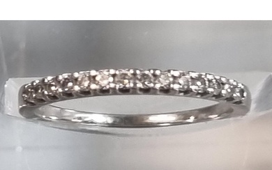 Modern platinum and diamond half eternity ring marked 'Pravi...