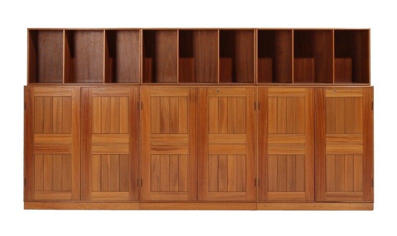Mogens Koch: Three solid mahogany cabinets, three half bookcases and tree bases with visible joints. Made by Rud. Rasmussen cabinetmakers. (9)