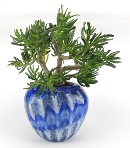 Murano blue glass vase by Castellani, housing a rubber fig, ...