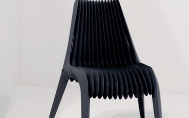 Oskar ZietaA “Steel in Rotation” Chair, designed by...