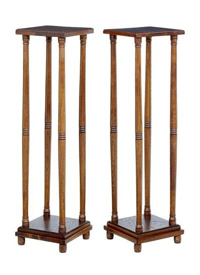 PAIR OF EARLY 20TH CENTURY OAK ARTS AND CRAFTS STANDS