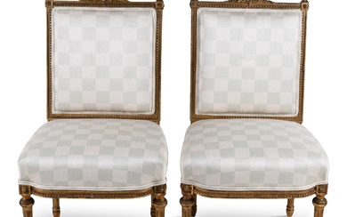PAIR OF LOUIS XVI STYLE GILTWOOD CHAISES, EARLY 20TH CENTURY 38 3/4 x 21 1/2 x 21 in. (98.4 x 54.6 x 53.3 cm.)