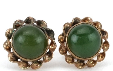 Pair of 18K gold cabochon green jade stud earrings, each 10m...