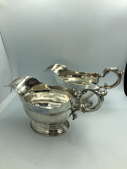 Pair of Georgian style silver pedestal oval sauce boats with...