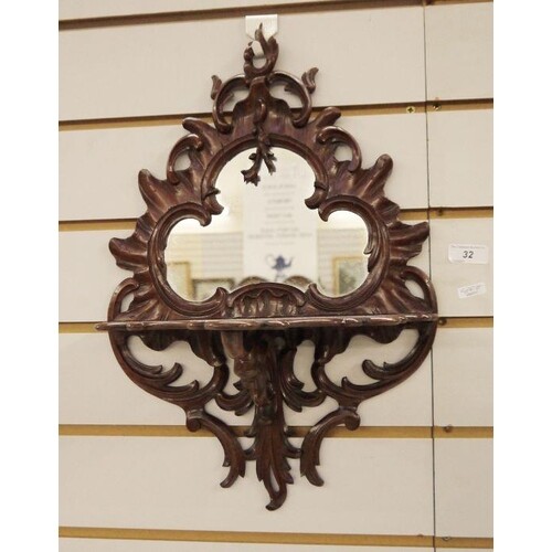 Possibly Victorian mirror with shaped glass plate in carved ...
