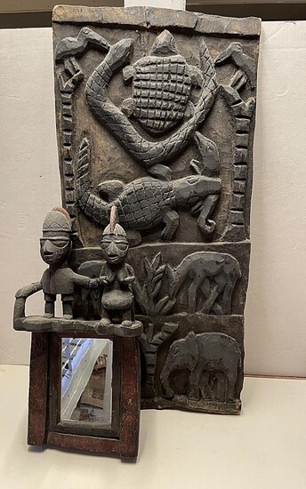 SOLD. Relief and mirror of carved and blackened wood. Dogon and Yoruba style. H. 43-75 cm. (2) – Bruun Rasmussen Auctioneers of Fine Art