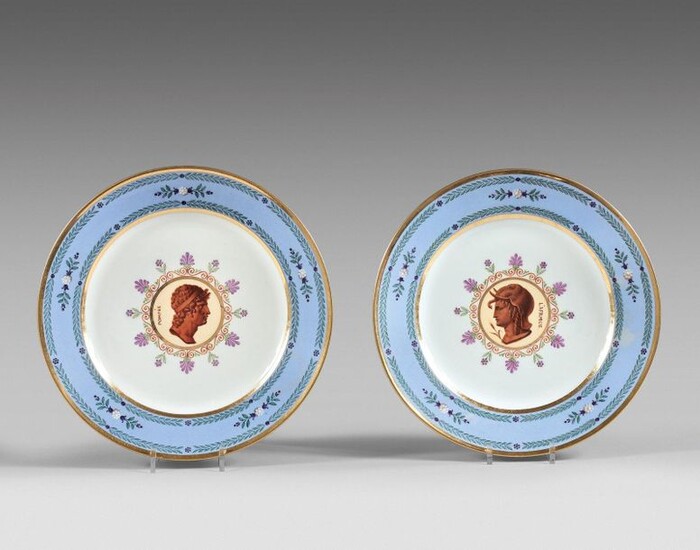 SÈVRES Two hard porcelain plates decorated in the center with...