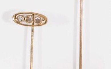 Set of two tie pins, one with oblong decoration set...