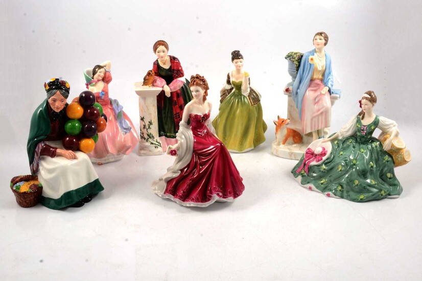 Seven Royal Doulton and Royal Worcester figurines.