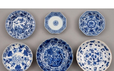 Six Chinese blue and white saucers, Kangxi period, one petal...