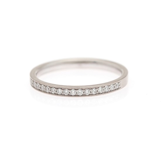Stenstrup: A diamond eternity ring set with numerous diamonds weighing a total of app. 0.16 ct., mounted in 18k white gold. F/VS. Size 55.5.