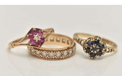THREE GEM SET RINGS, the first a sapphire floral cluster, ha...