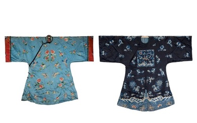 TWO CHINESE EMBROIDERED BLUE-GROUND SILK ROBES, CIRCA 1900 A...