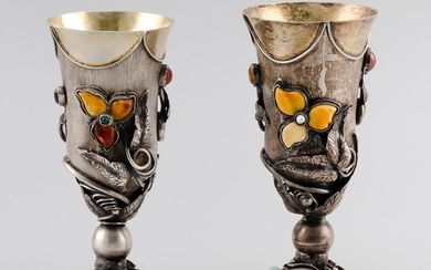 TWO MIDDLE EASTERN SILVER GOBLETS INLAID WITH MOTHER-OF-PEARL AND HARDSTONES Unidentified marks. Heights 5.75". Approx. 14.0 total t...