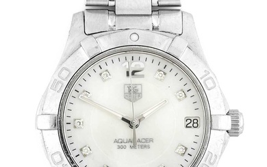 Tag Heuer: A Lady's Stainless Steel Calendar Centre Seconds Wristwatch,...
