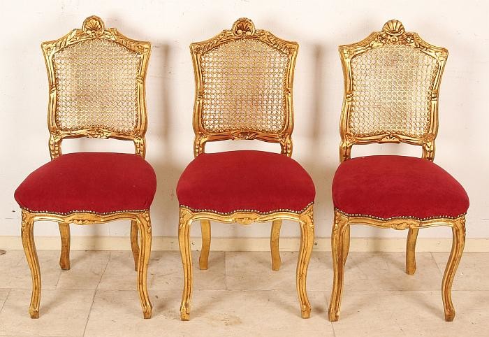 Three Italian gilt chairs in Baroque style. Second half
