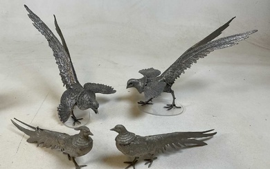Two pairs of vintage white metal bird studies including a...